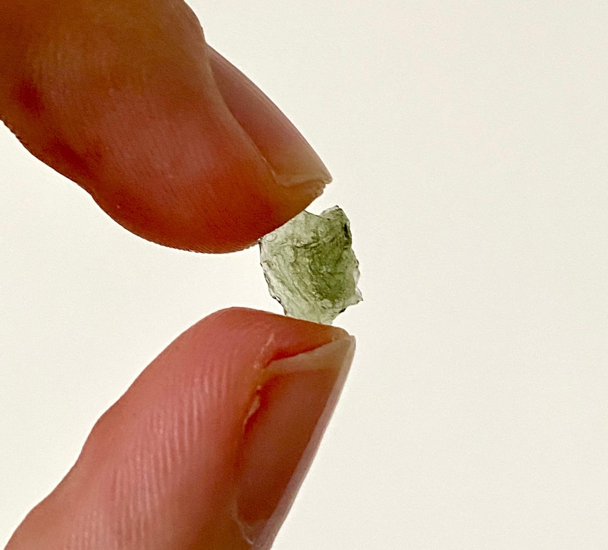 0.37" Moldavite (tektite) formed by a meteorite impact - FossilsAndMore