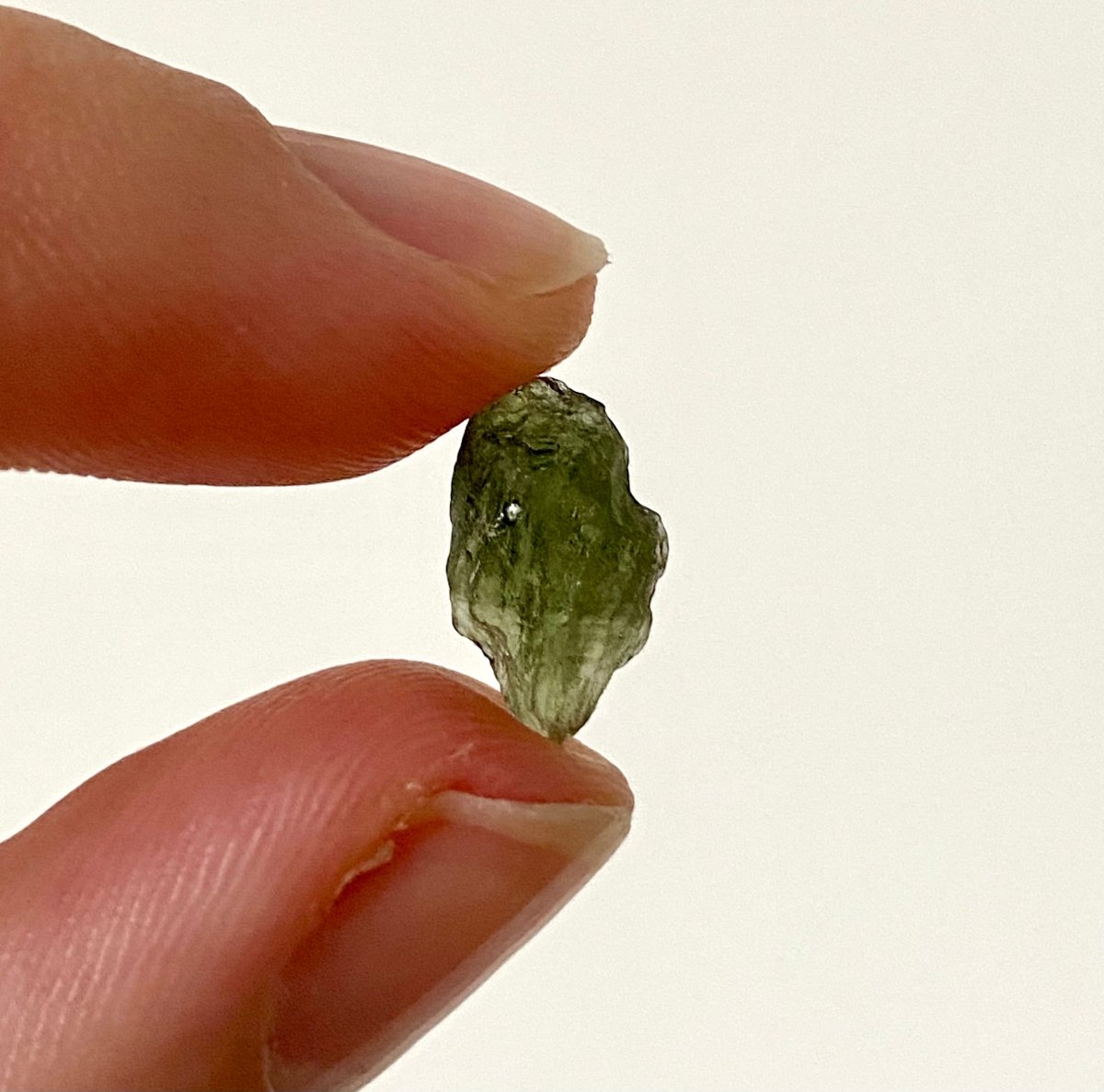 0.54" Moldavite (tektite) formed by a meteorite impact - FossilsAndMore