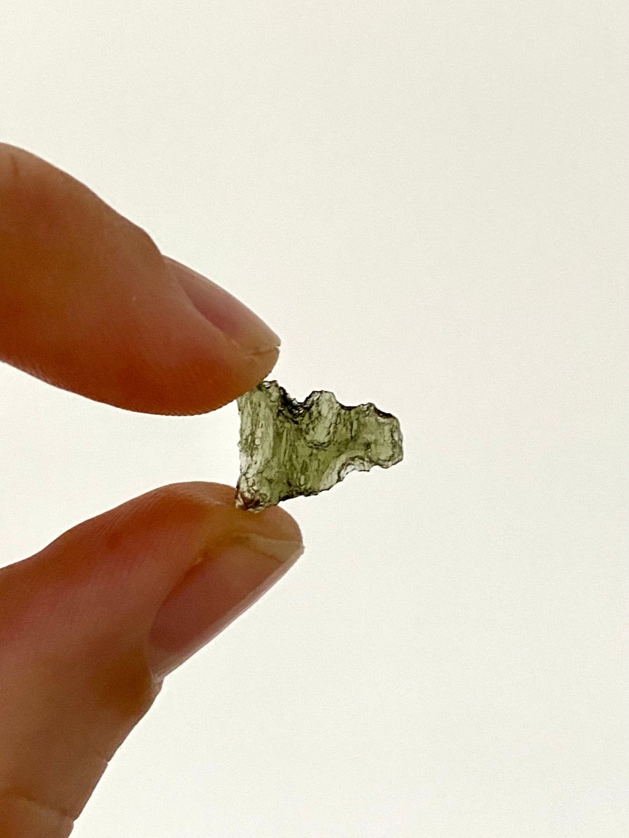 0.58" Moldavite (tektite) formed by a meteorite impact - FossilsAndMore