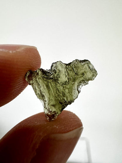 0.58" Moldavite (tektite) formed by a meteorite impact - FossilsAndMore