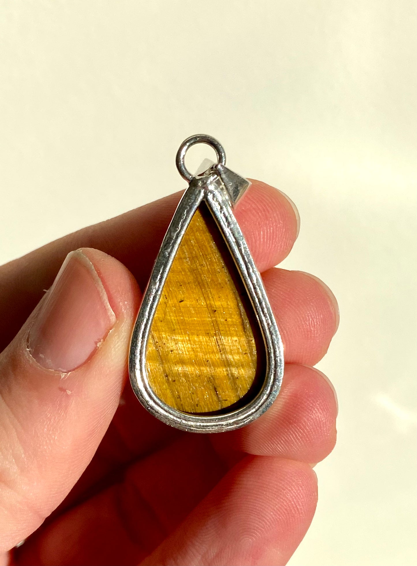 Tiger's Eye Pendant on necklace, mineral