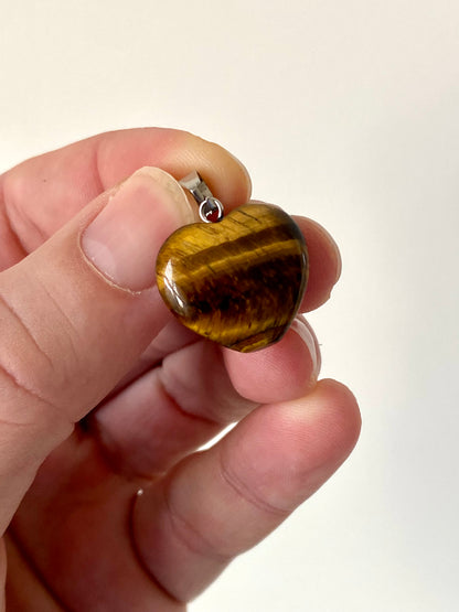 Tiger's Eye hart shaped pendant on necklace, mineral