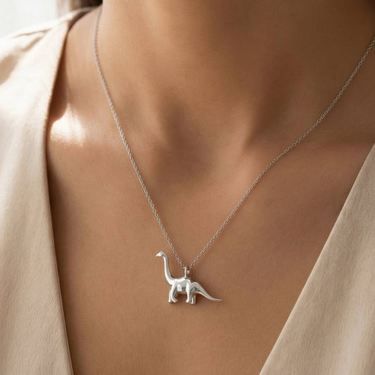 Necklace with a pendant of a Brachiosaurus dinosaur in silver - FossilsAndMore