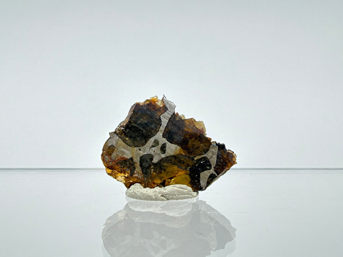Seymchan Pallasite Meteorite from Russia | 1.66 Grams - FossilsAndMore