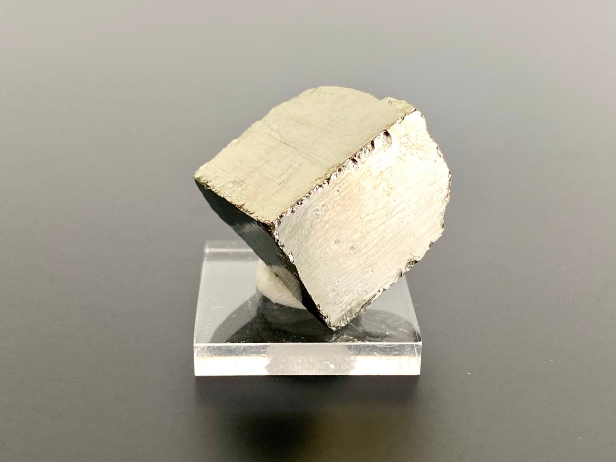 Small Pyrite cube on acrylic plate (Navajun, Spain) - FossilsAndMore