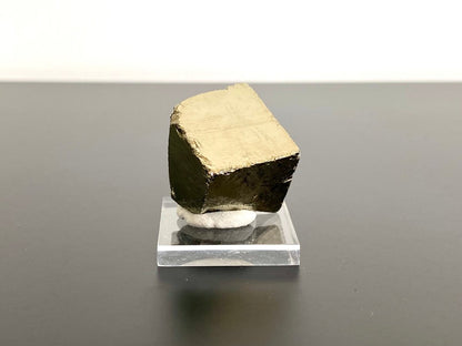 Small Pyrite cube on acrylic plate (Navajun, Spain) - FossilsAndMore